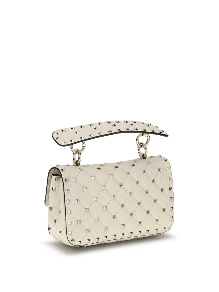 Rockstud Spike mini Top Handle Bag in nappa