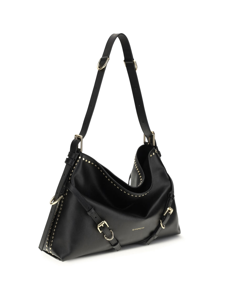 Large Voyou Shoulder Bag in shiny leather 2