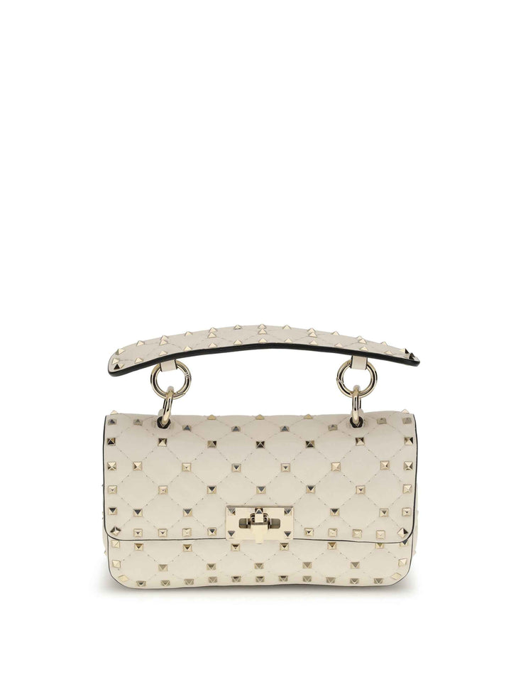 Rockstud Spike mini Top Handle Bag in nappa